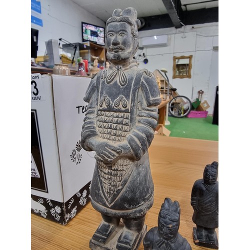 353 - A quantity of terracotta army figures, 9 in total, along with 2 boxed as new 'tea for 2' sets by Flo... 
