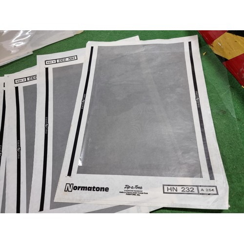 354 - A large quantity of various transferable graphic aids including  full sets of letter and numbers in ... 
