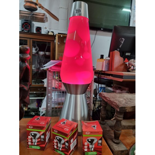 359 - A very large impressive lava lamp standing at a massive 69cm tall, with a diameter of 18cm, in full ... 