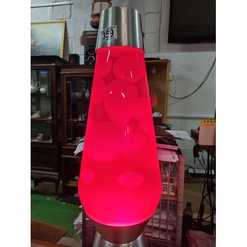 359 - A very large impressive lava lamp standing at a massive 69cm tall, with a diameter of 18cm, in full ... 