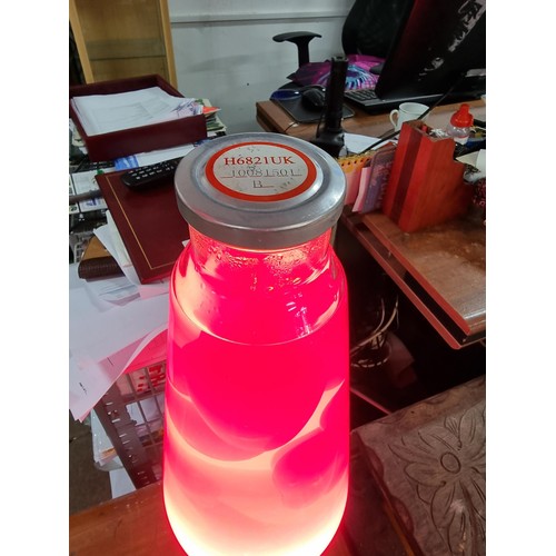 359 - A very large impressive lava lamp standing at a massive 69cm tall, with a diameter of 18cm, in full ... 