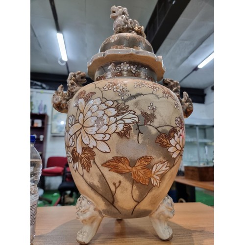 363 - A pair of good quality antique Chinese lidded temple vases with a pretty design with overlaid enamel... 