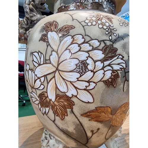 363 - A pair of good quality antique Chinese lidded temple vases with a pretty design with overlaid enamel... 