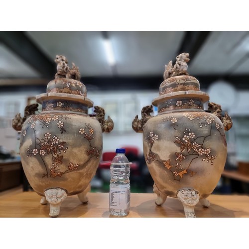 363 - A pair of good quality antique Chinese lidded temple vases with a pretty design with overlaid enamel... 