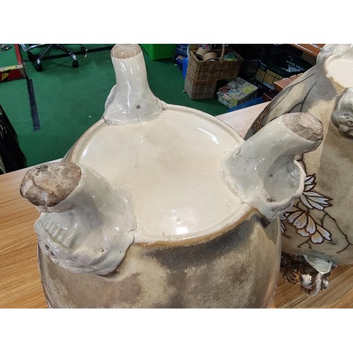 363 - A pair of good quality antique Chinese lidded temple vases with a pretty design with overlaid enamel... 