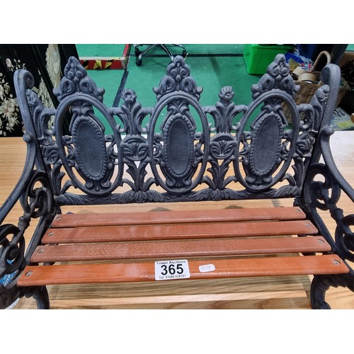 365 - A good quality miniature ornamental cast iron bench with wooden slats, in excellent clean condition ... 