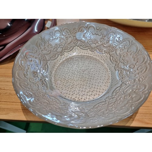 366 - 3x large decorative glass bowls including a large hand blown at glass bowl with a purple swirl desig... 