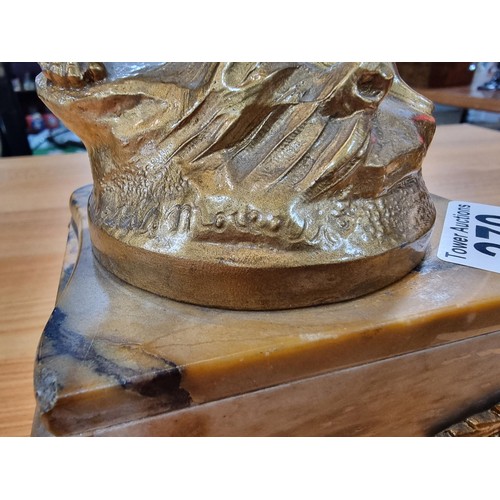 370 - An impressive gilt Spelter figure of a lady holding a dove and a letter in the other hand, set on a ... 