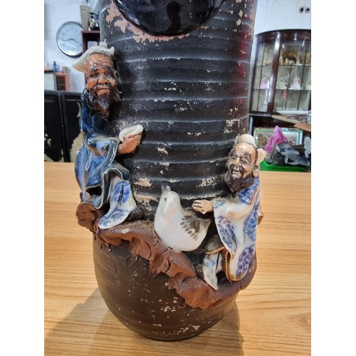 372 - An antique Japanese Sumida Gawa drip glaze vase signed to the rear by Ishiguro Koko with overlaid 3d... 