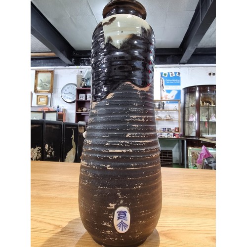 372 - An antique Japanese Sumida Gawa drip glaze vase signed to the rear by Ishiguro Koko with overlaid 3d... 