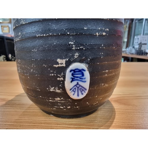 372 - An antique Japanese Sumida Gawa drip glaze vase signed to the rear by Ishiguro Koko with overlaid 3d... 