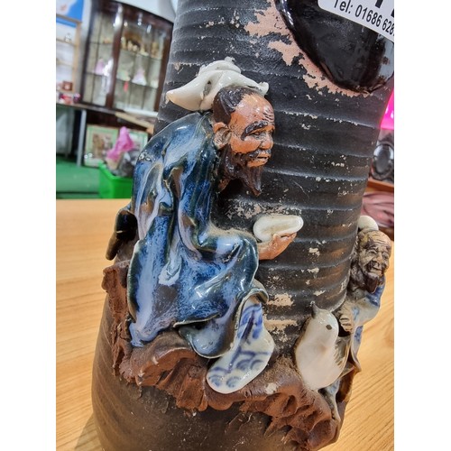 372 - An antique Japanese Sumida Gawa drip glaze vase signed to the rear by Ishiguro Koko with overlaid 3d... 