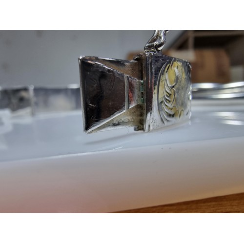 376 - A tested as sterling silver 3 piece bangle, along with an ornate engraved 925 silver hinged bracelet... 