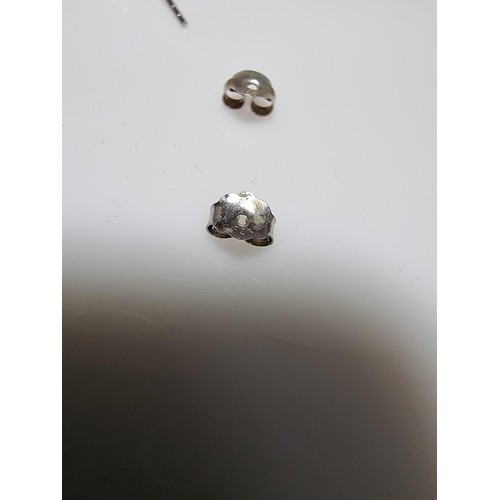 377 - A pair of 925 silver long drop earrings with 3 Amethyst bead ends. Length of the drop is 7cm, in goo... 