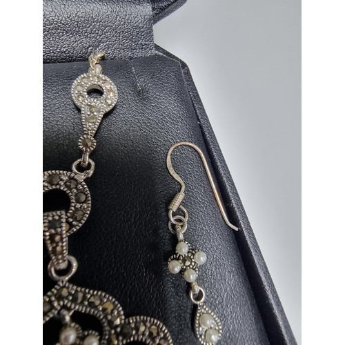 378 - A boxed pretty 925 silver matching jewellery set including a necklace inset with marcasite stones an... 