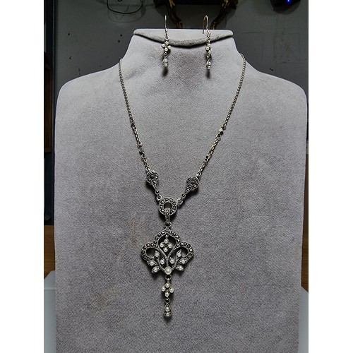 378 - A boxed pretty 925 silver matching jewellery set including a necklace inset with marcasite stones an... 