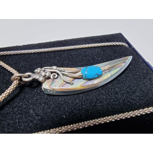 384 - A pretty ornate 925 silver pendant on an 18