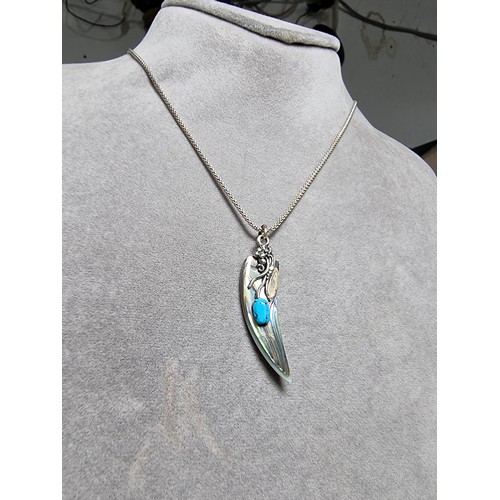 384 - A pretty ornate 925 silver pendant on an 18