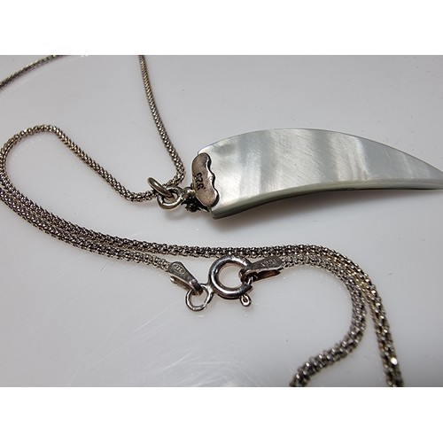 384 - A pretty ornate 925 silver pendant on an 18