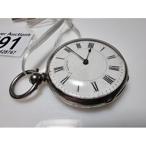 391 - A sterling silver pocket watch by C.Mathey, with a door which opens to the front and back. In good c... 