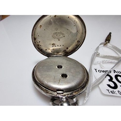 391 - A sterling silver pocket watch by C.Mathey, with a door which opens to the front and back. In good c... 