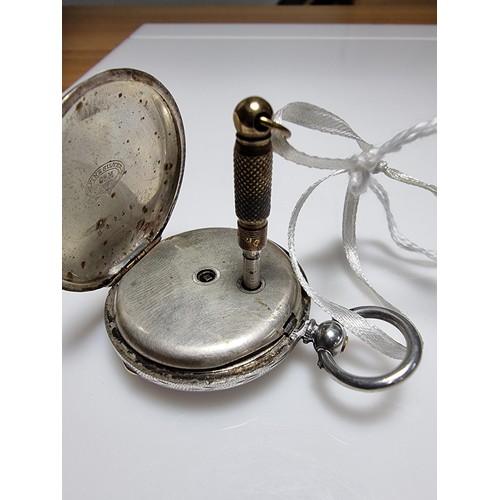 391 - A sterling silver pocket watch by C.Mathey, with a door which opens to the front and back. In good c... 