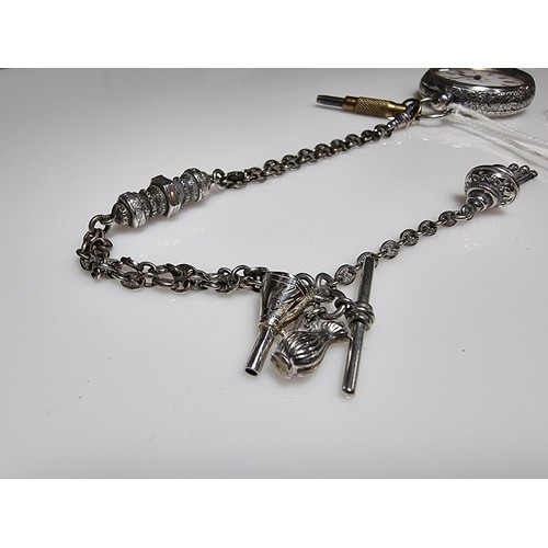 392 - A good quality genuine Swiss 935 silver fob watch with an ornate engraved design featuring an ornate... 