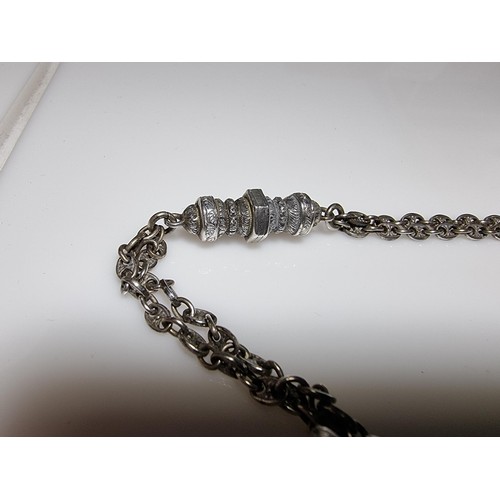 392 - A good quality genuine Swiss 935 silver fob watch with an ornate engraved design featuring an ornate... 