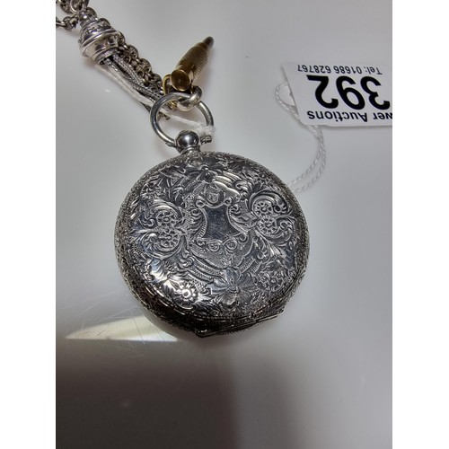 392 - A good quality genuine Swiss 935 silver fob watch with an ornate engraved design featuring an ornate... 