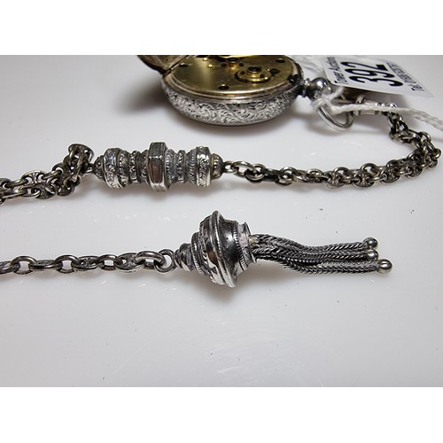 392 - A good quality genuine Swiss 935 silver fob watch with an ornate engraved design featuring an ornate... 