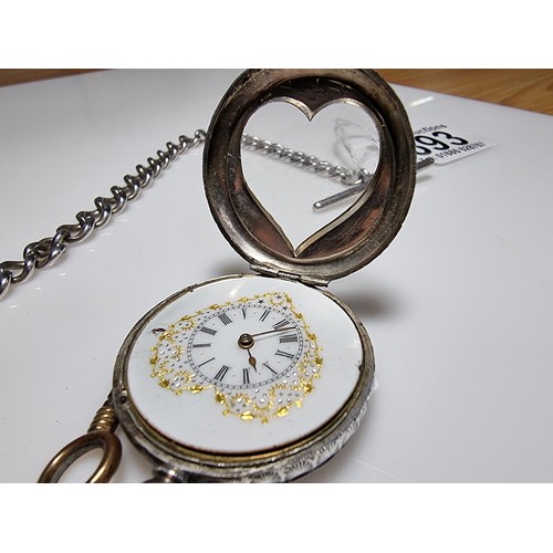 393 - A fine quality genuine Swiss, pretty 935 silver pocket watch with a heart shaped frame around the di... 