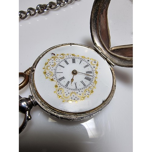 393 - A fine quality genuine Swiss, pretty 935 silver pocket watch with a heart shaped frame around the di... 