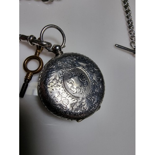 393 - A fine quality genuine Swiss, pretty 935 silver pocket watch with a heart shaped frame around the di... 