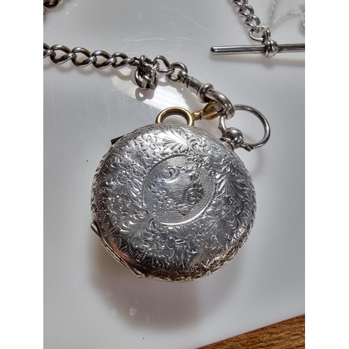 393 - A fine quality genuine Swiss, pretty 935 silver pocket watch with a heart shaped frame around the di... 