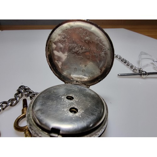 393 - A fine quality genuine Swiss, pretty 935 silver pocket watch with a heart shaped frame around the di... 