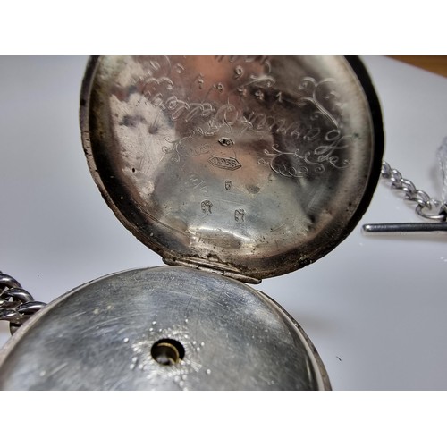 393 - A fine quality genuine Swiss, pretty 935 silver pocket watch with a heart shaped frame around the di... 