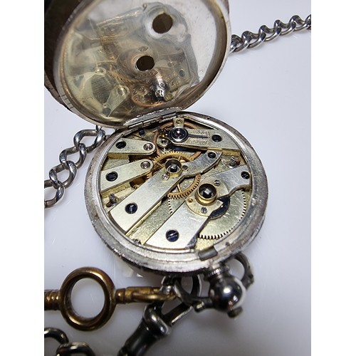 393 - A fine quality genuine Swiss, pretty 935 silver pocket watch with a heart shaped frame around the di... 