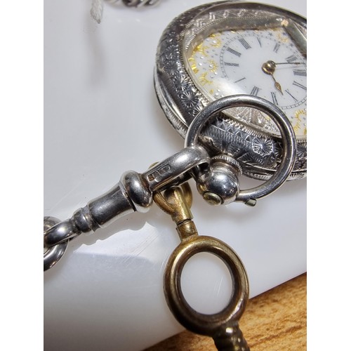 393 - A fine quality genuine Swiss, pretty 935 silver pocket watch with a heart shaped frame around the di... 