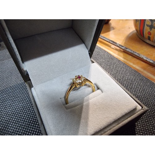 396 - A quantity of boxed dress rings and a silver plated bracelet to include an ornate ring with an aura ... 