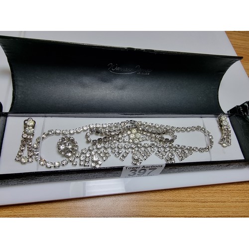 397 - A quantity of costume jewellery including a Spode brooch and earring set in good condition with no d... 