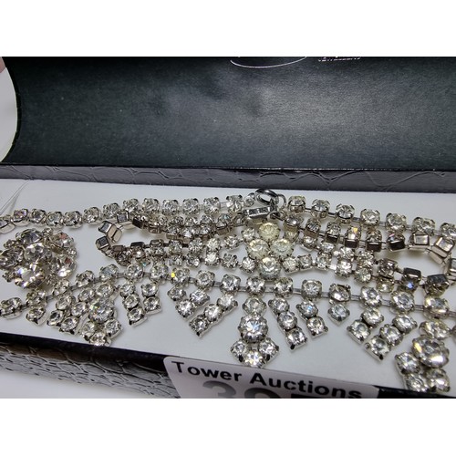 397 - A quantity of costume jewellery including a Spode brooch and earring set in good condition with no d... 