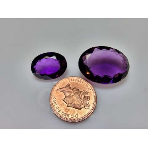 405 - A selection of 6 faceted gemstones to include 2 genuine tested as amethyst faceted gemstones and 4 o... 