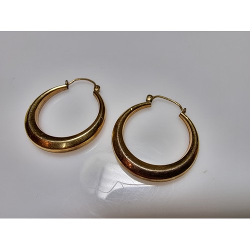 409 - A pair of rolled gold hoop earrings in excellent clean condition with no dents or dinks. Diameter of... 
