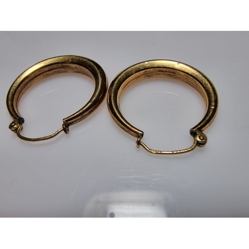 409 - A pair of rolled gold hoop earrings in excellent clean condition with no dents or dinks. Diameter of... 
