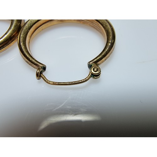 409 - A pair of rolled gold hoop earrings in excellent clean condition with no dents or dinks. Diameter of... 