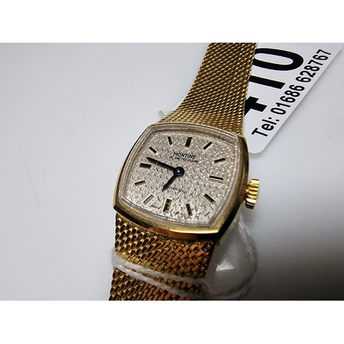 410 - A good quality unused ladies gold plated wrist watch by Montine of Switzerland with a wind up moveme... 