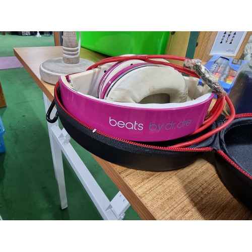 465 - A box full of various collectables including a set of cased beats by dr.dre headphones, a box full o... 