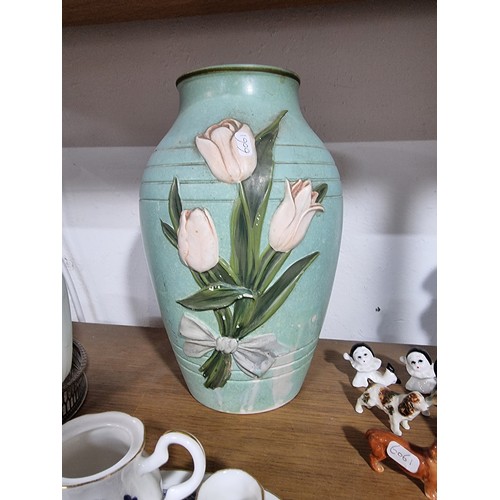 340 - A shelf full of good quality collectables including an interesting antique blue and white Chinese va... 