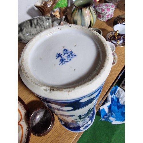 340 - A shelf full of good quality collectables including an interesting antique blue and white Chinese va... 