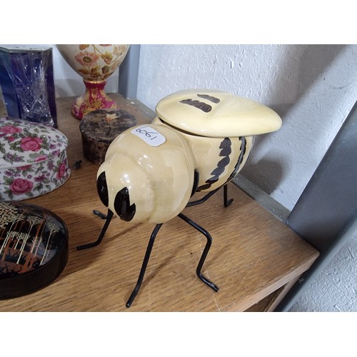 340 - A shelf full of good quality collectables including an interesting antique blue and white Chinese va... 